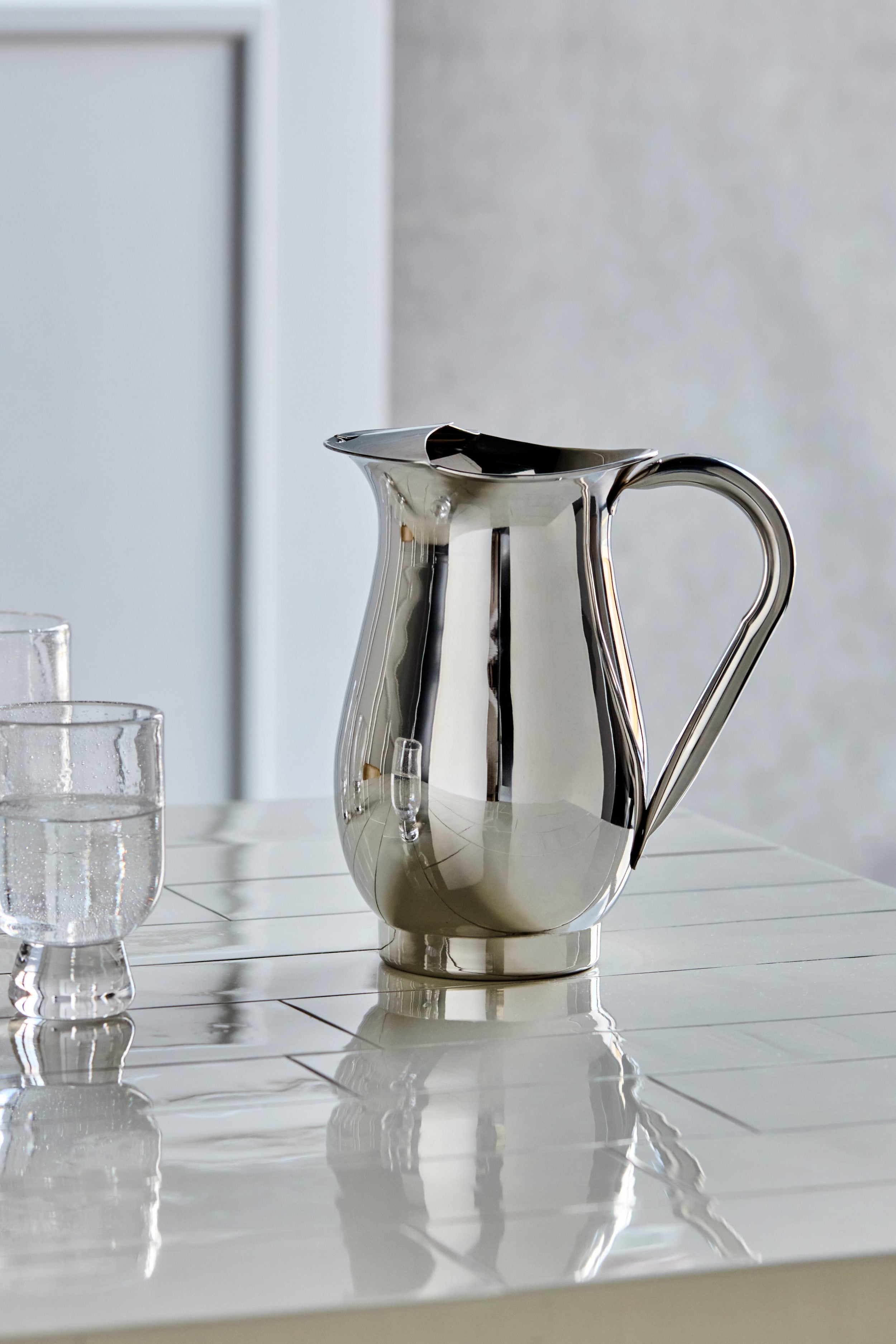 silver jug with ice pourer