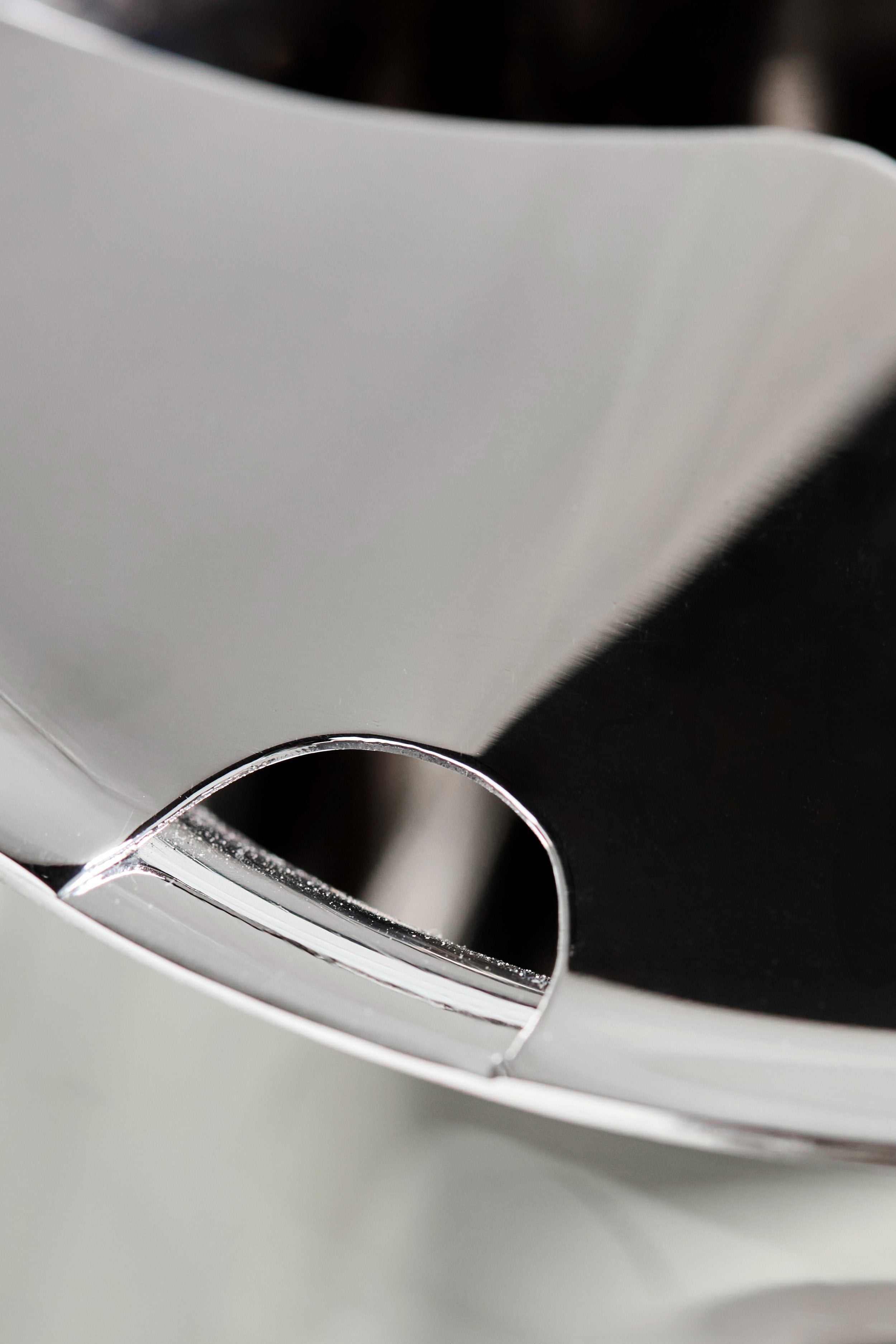 silver jug with ice pourer