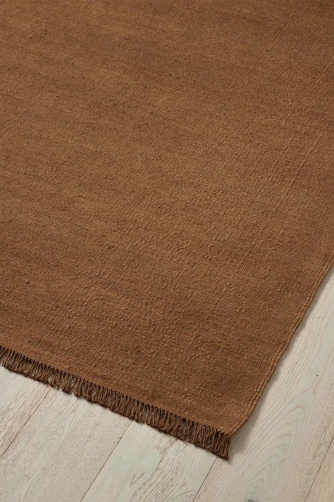 emilio linen floor rug tumeric