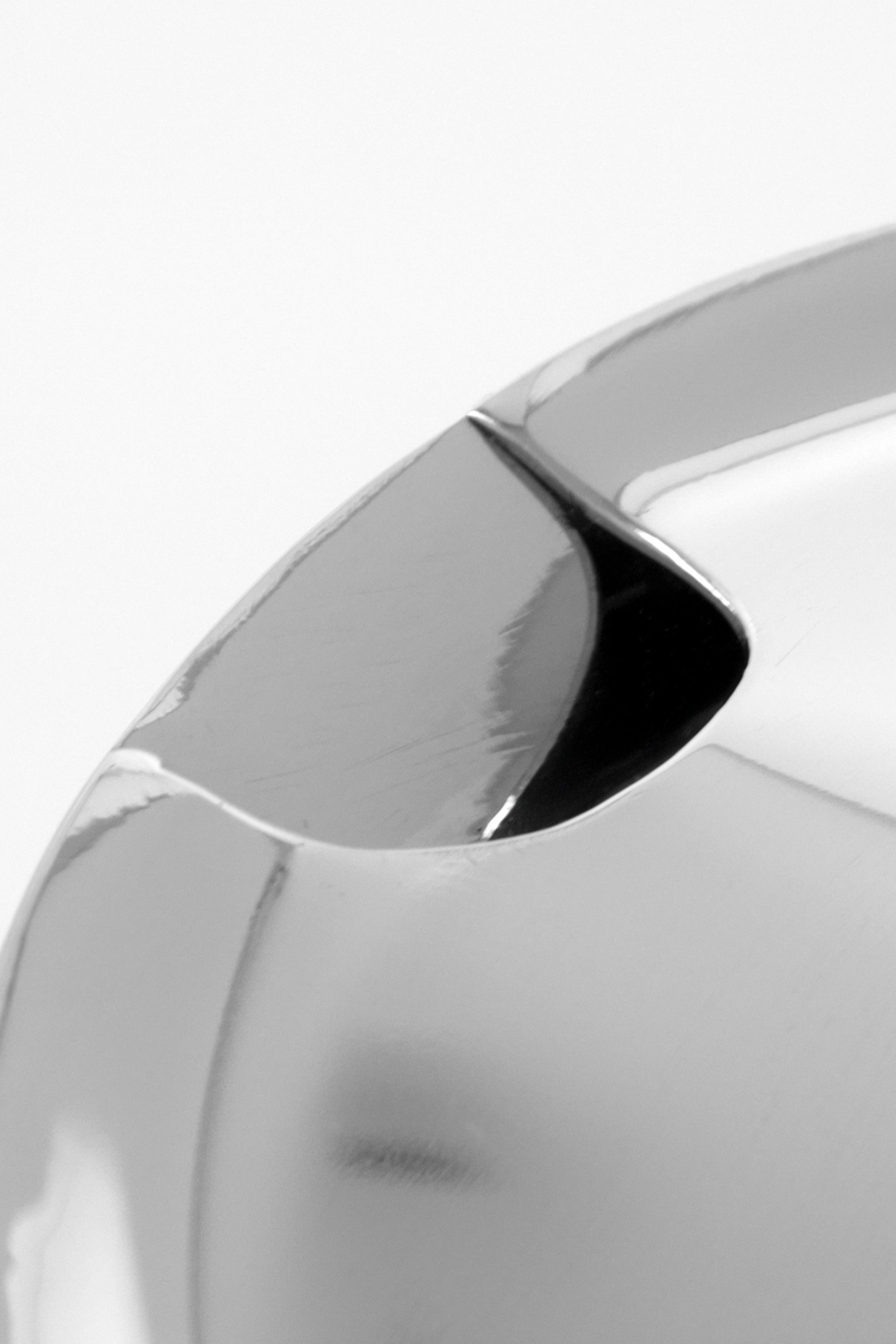 silver jug with ice pourer